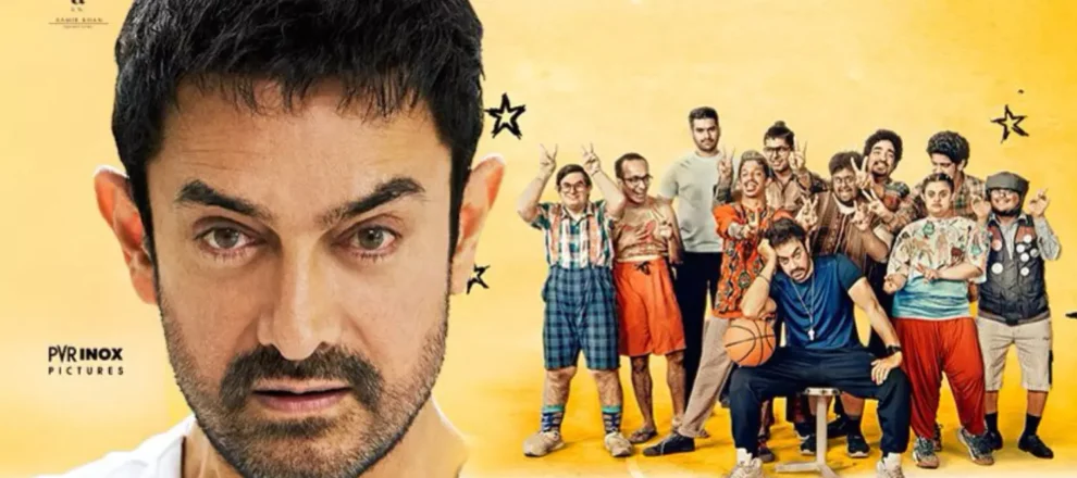 Aamir Khan comforting a young boy in a school art room scene from Sitaare Zameen Par.